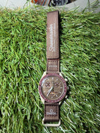 Omega Swatch Marrone